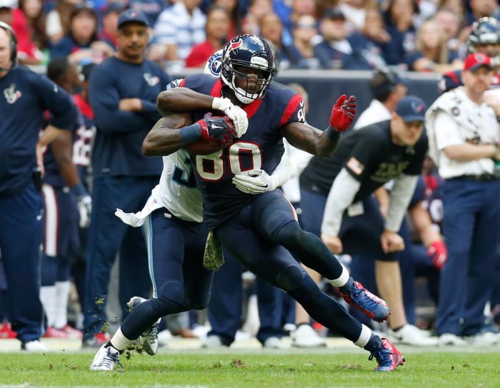Texans receiver Andre Johnson (80) runs after a reception against the Tennessee Titans at NRG Stadium.
